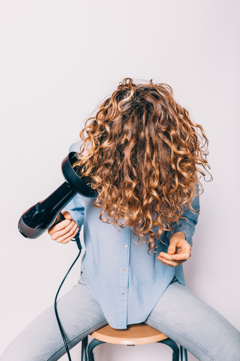 Blow drying curly hair