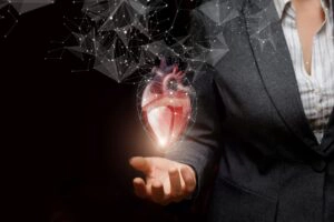 Woman holding image of a heart