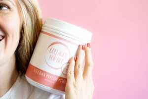 Collagen for her woman holding Peptide Powder