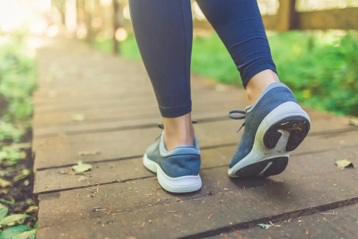 image of shoes with a woman out for a walk or run