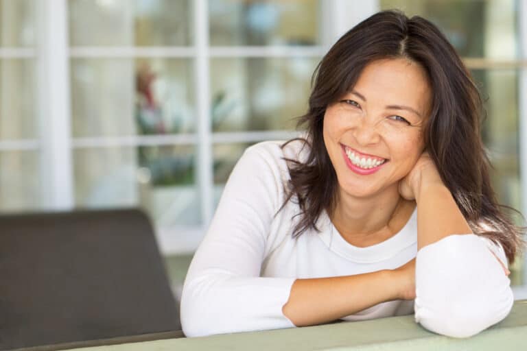 Asian woman smiling - ProBiora Health oral care