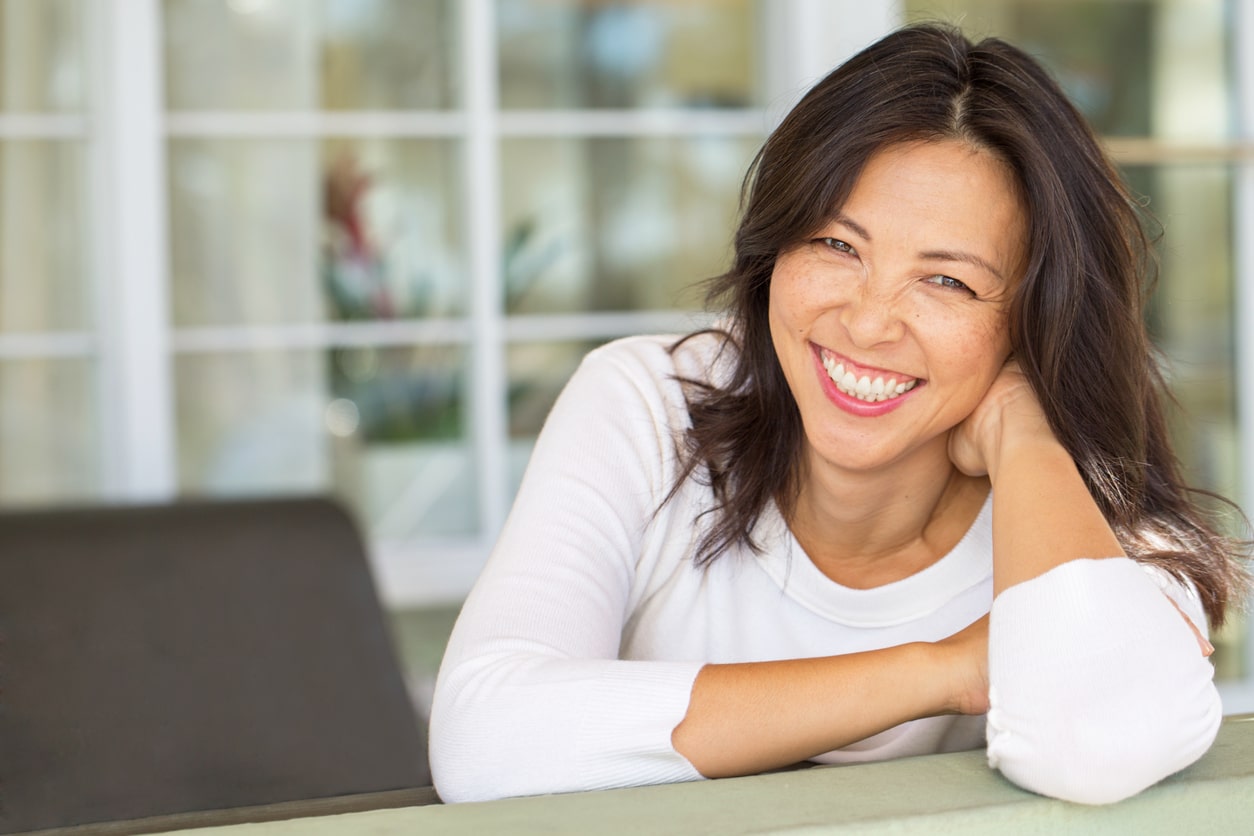 Asian woman smiling - ProBiora Health oral care