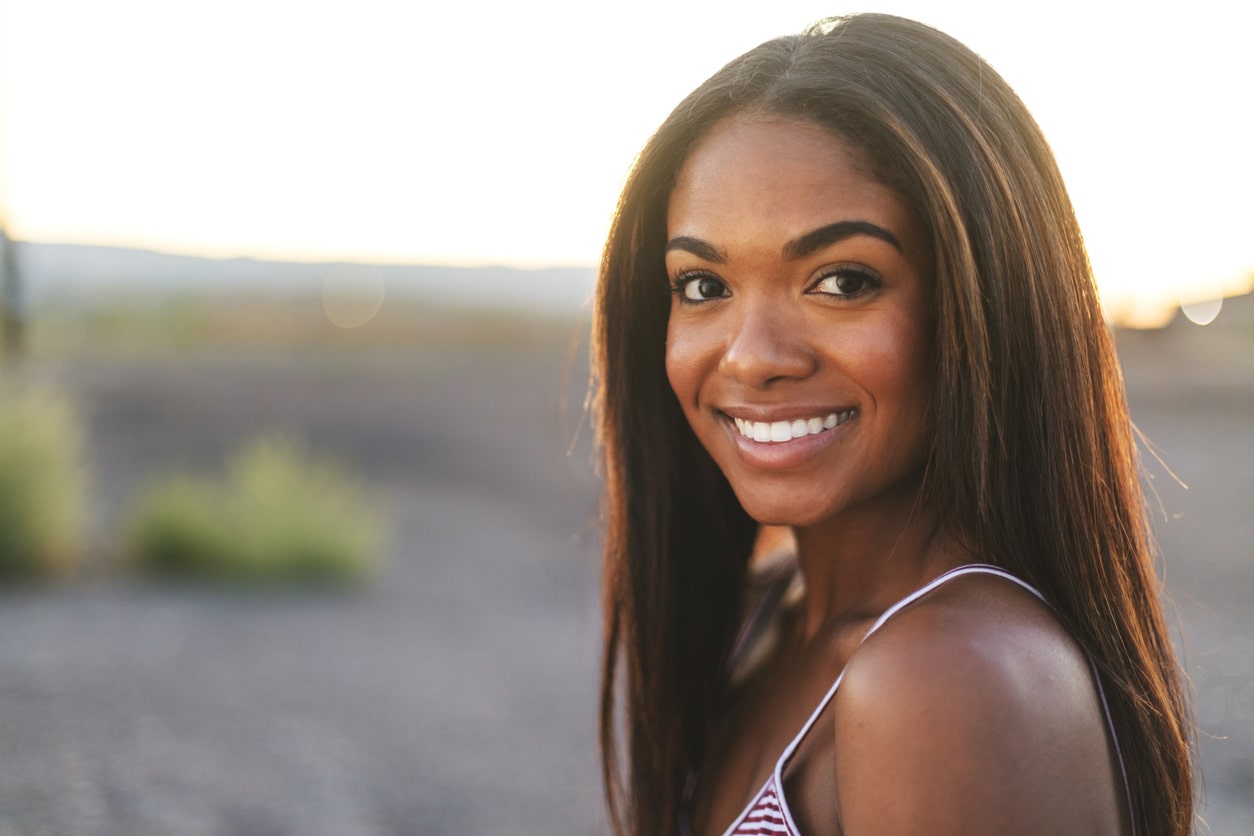 Young African American woman with straight hair