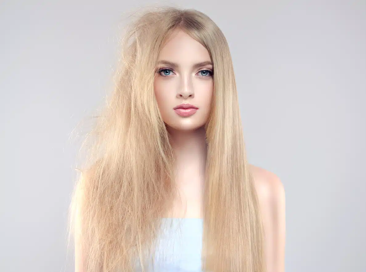 Girl with half frizzy half smooth hair for brazilian blowout kearatin 