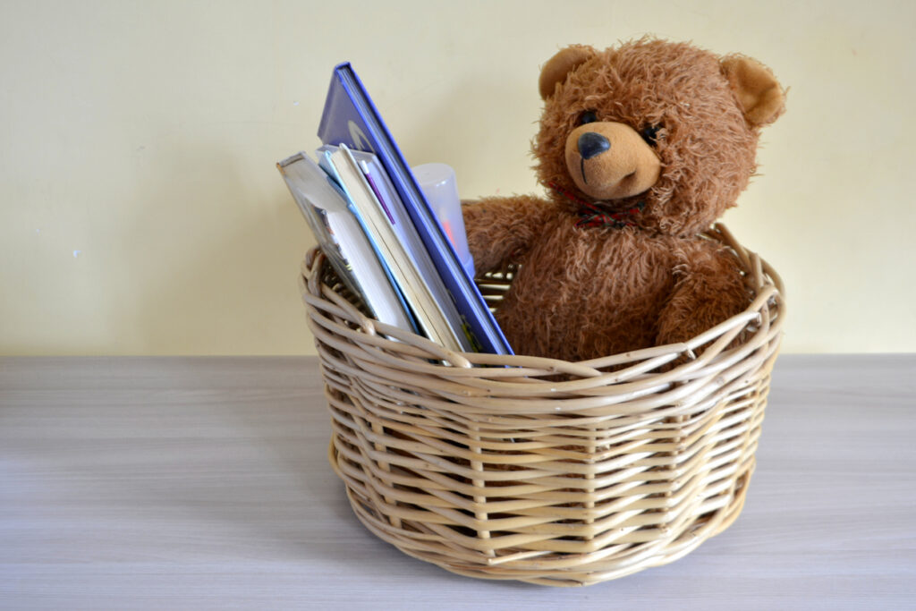 Gifts for expectant grandparents - basket of books and a bear