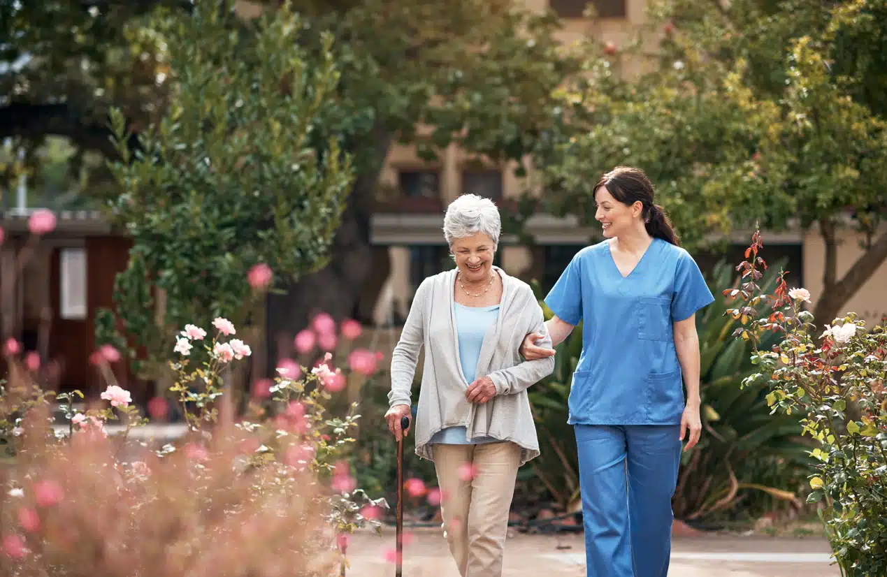 Woman walking with nurse