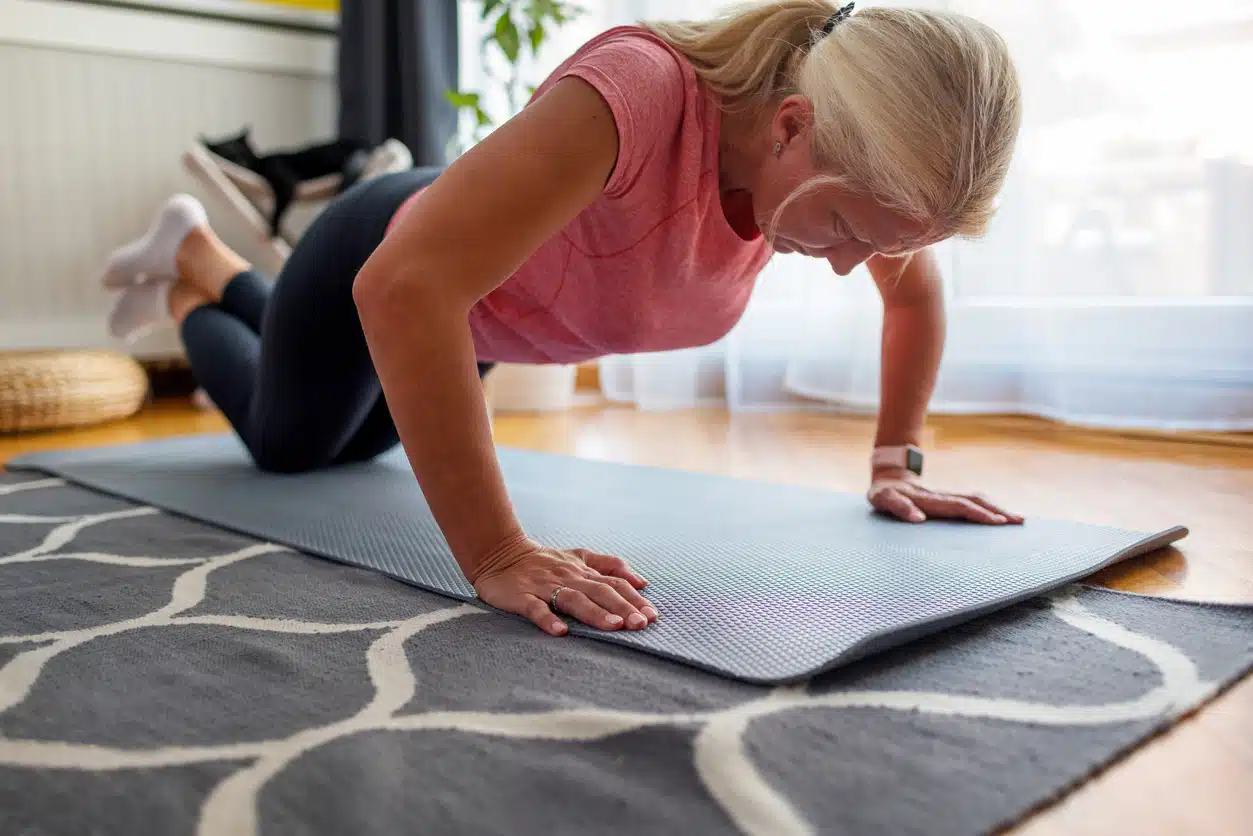 3 Ways to Lift Sagging Breast - Woman doing a pushup or a plank