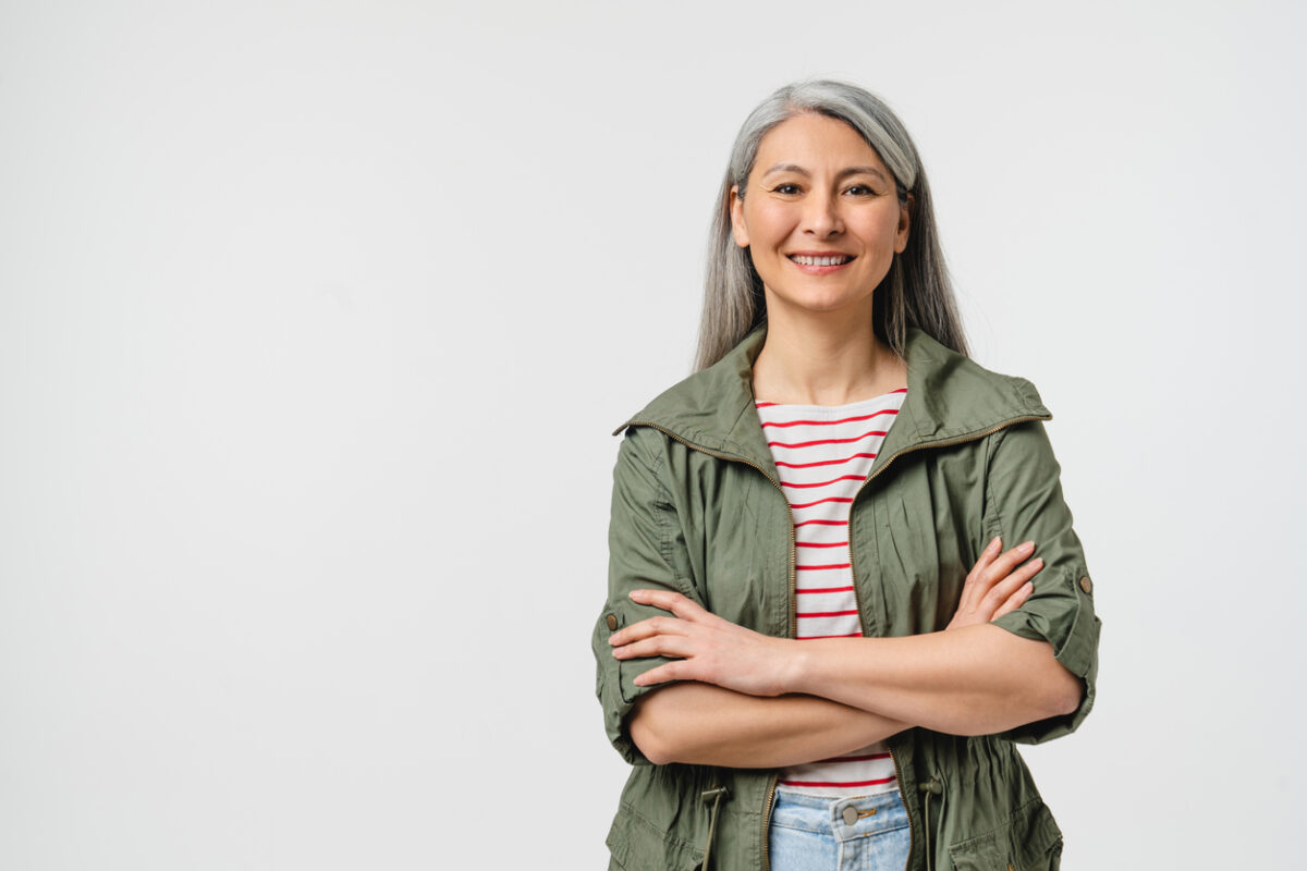 woman with gray hair and a side part, beautiful woman