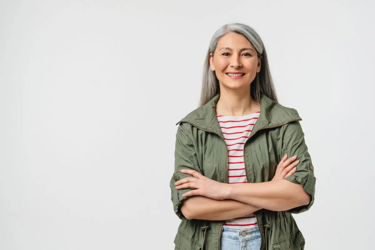 woman with gray hair and a side part, beautiful woman