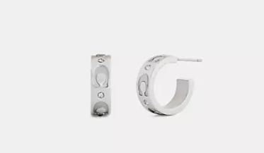 Coach Repeated C Huggie Earrings, $65