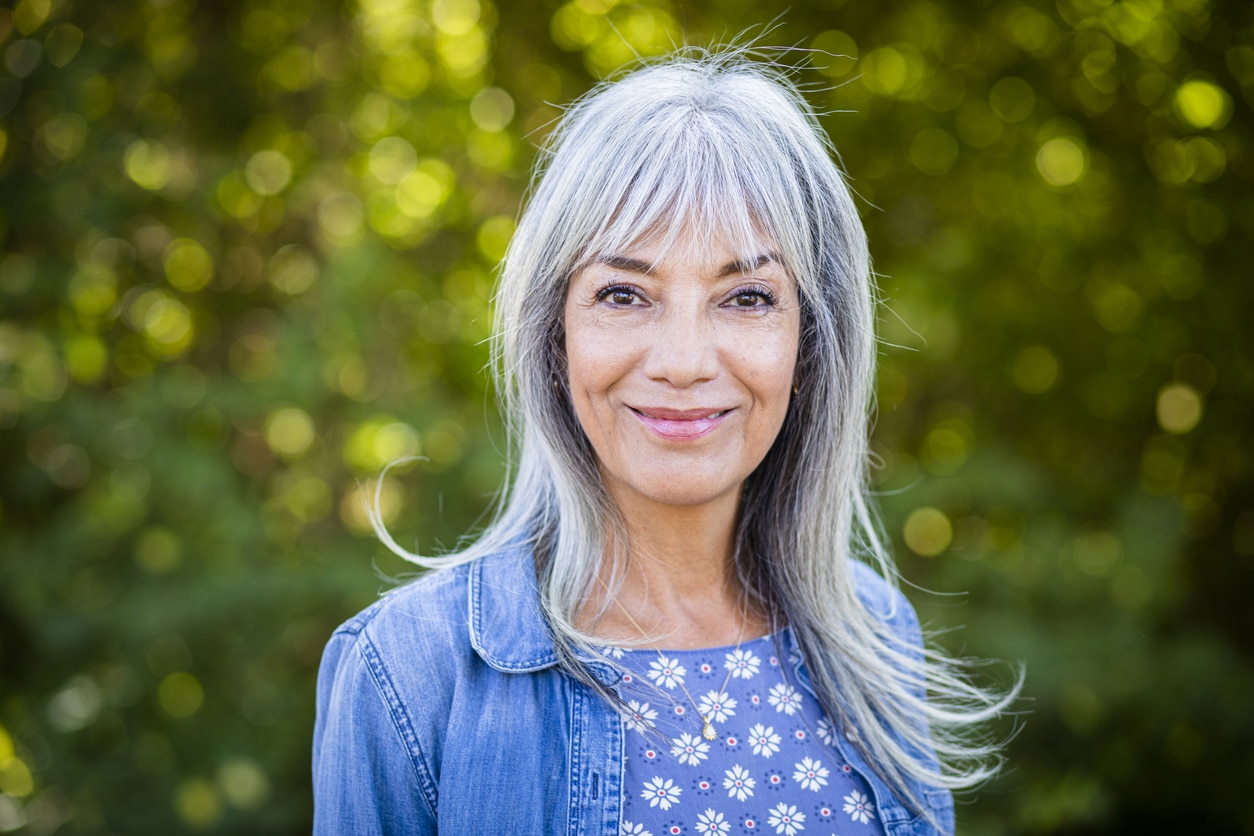 Woman with gray hair and bangs