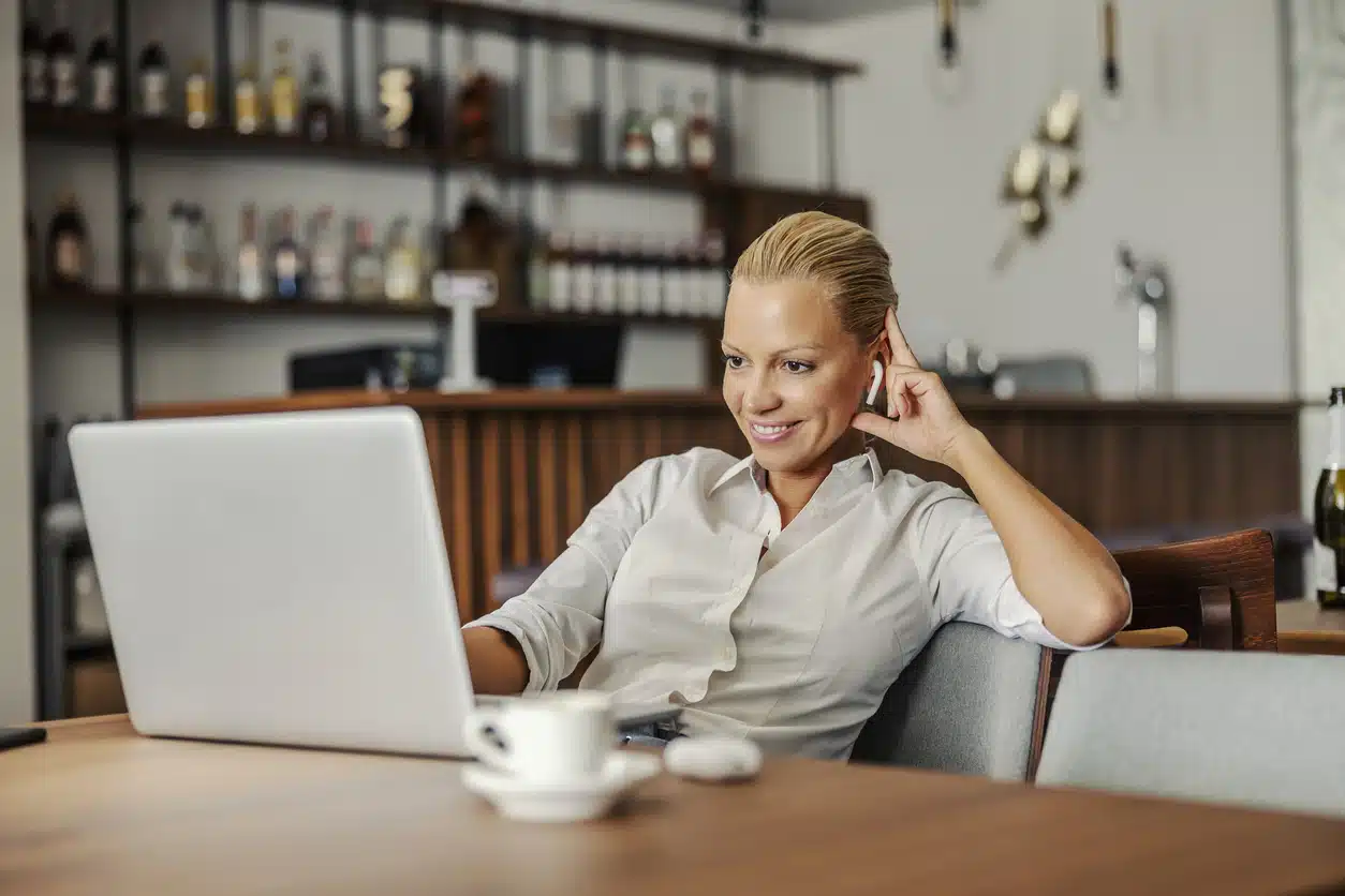 Woman working while dining alone