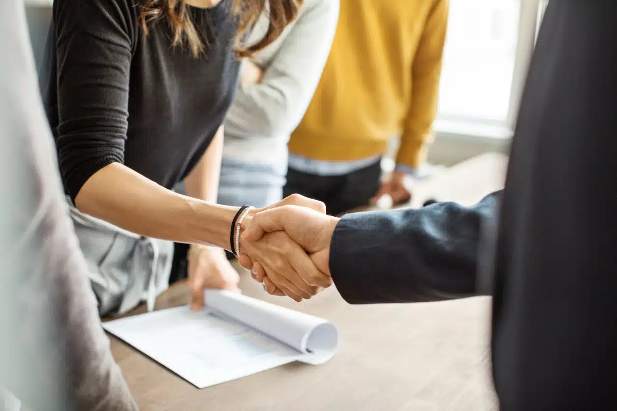 Business negotiations; shaking hands