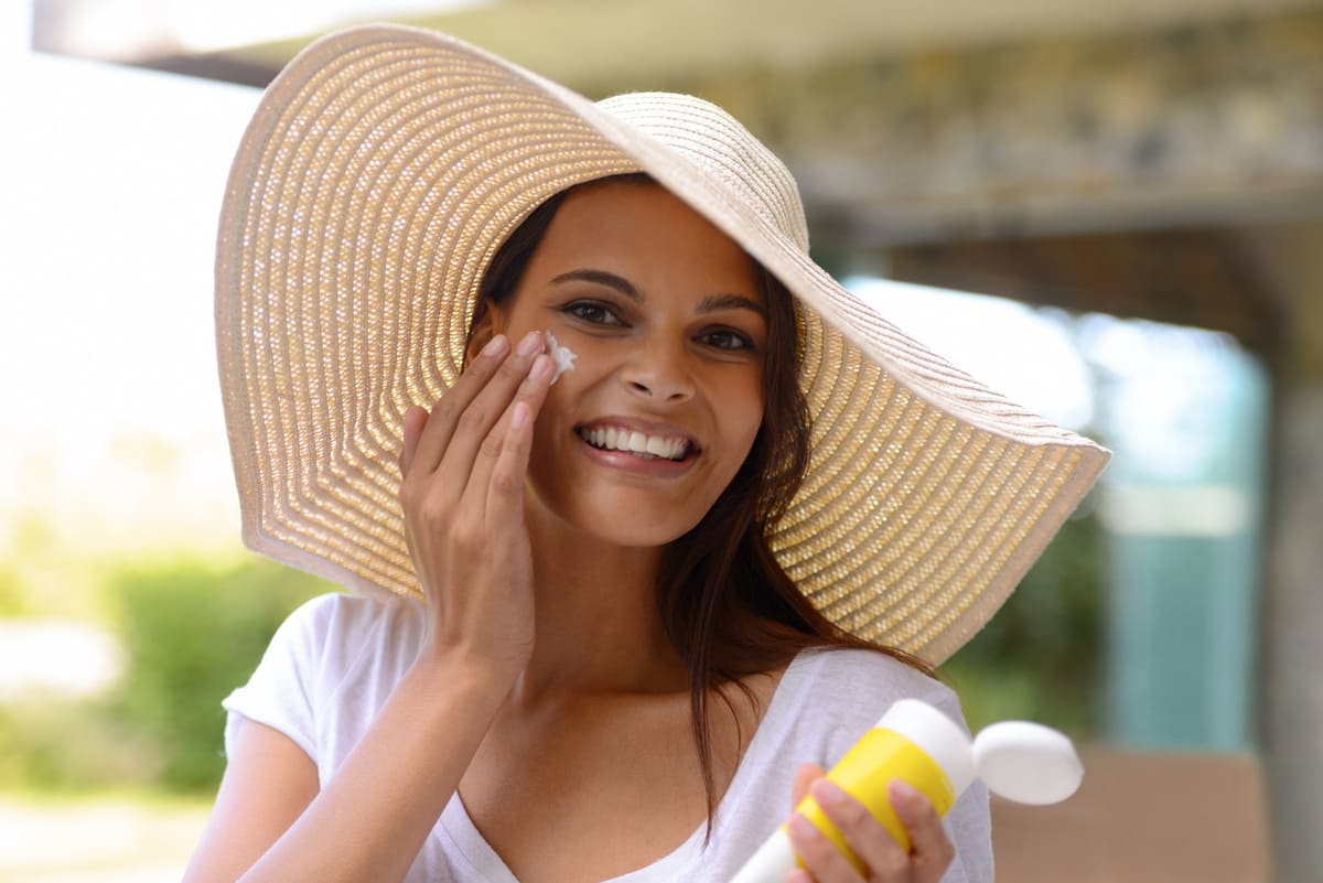 Sunscreen and a sun hat to help prevent hyperpigmentation
