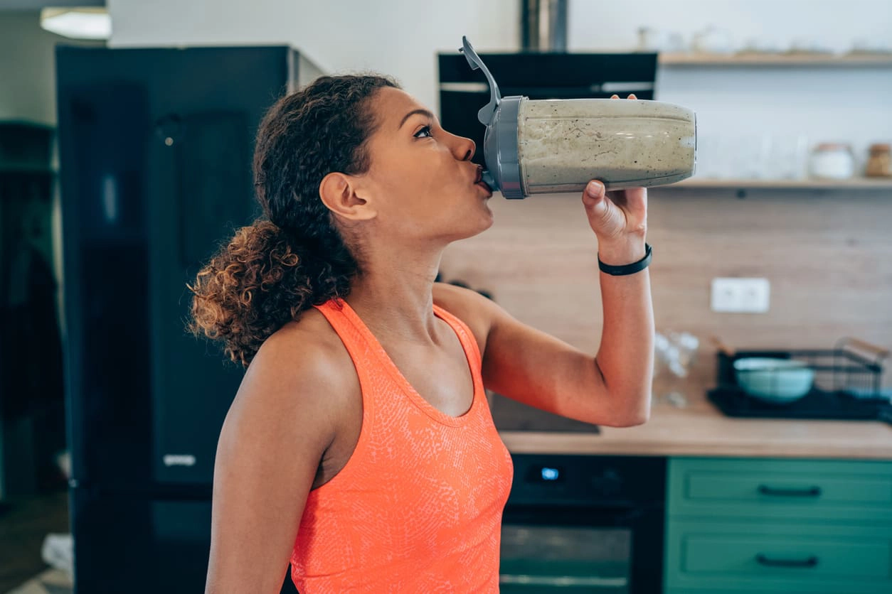 Woman drinking a protein shake