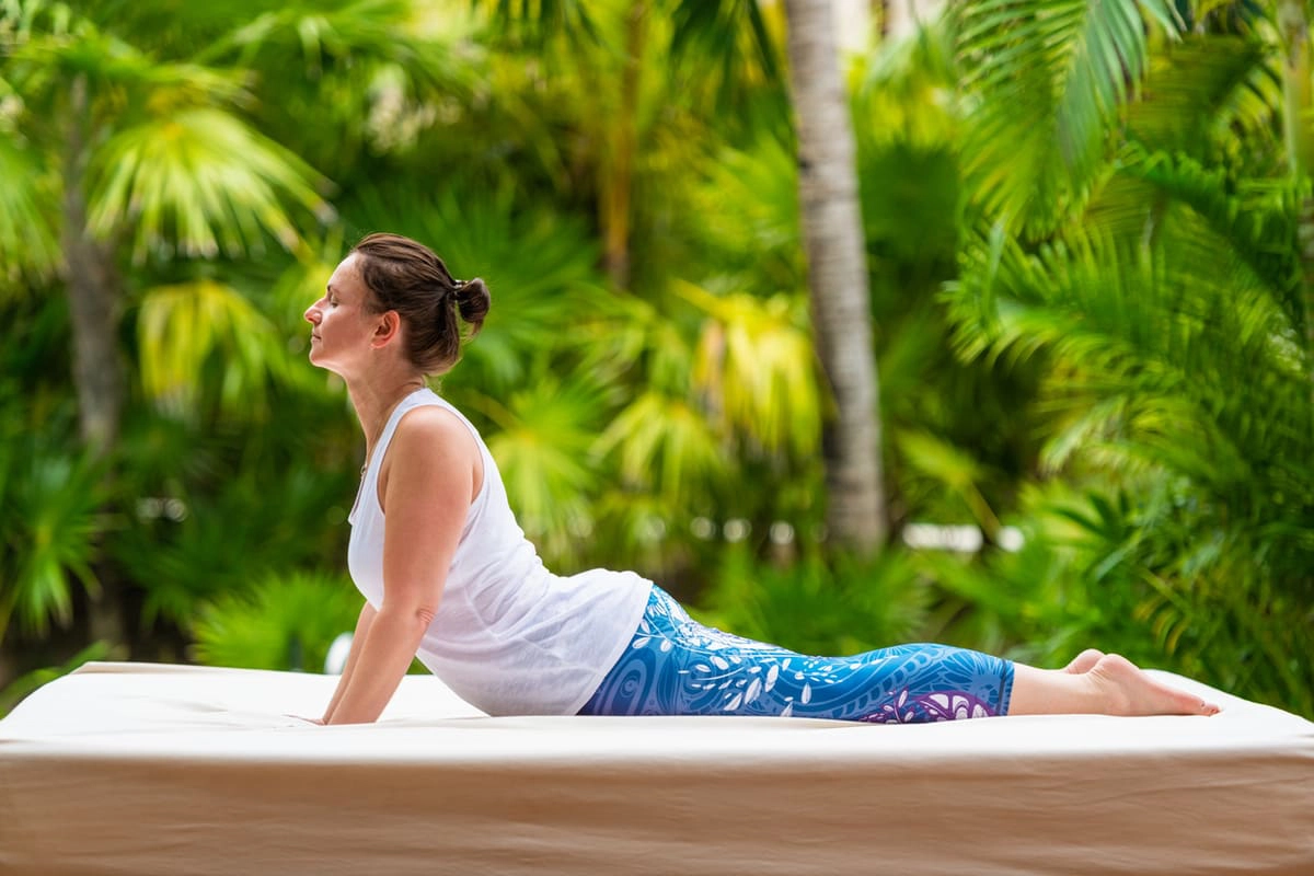 Cobra pose for burning belly fat