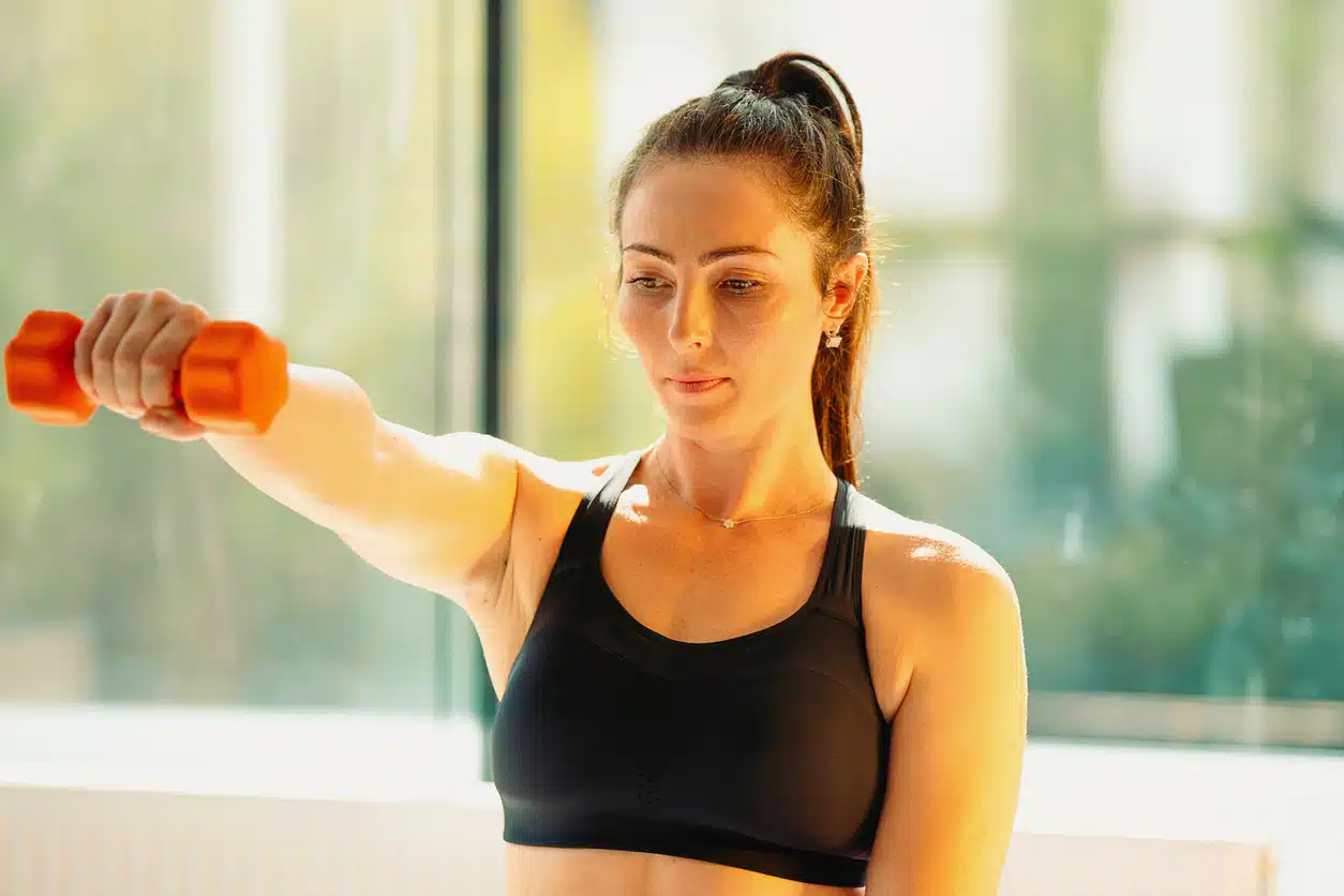 Diagonal dumbbell raises