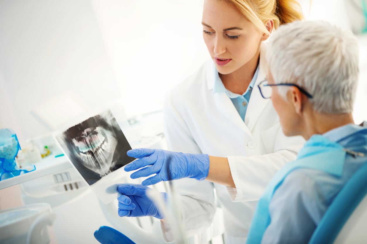 Woman at dentist or oral surgeon