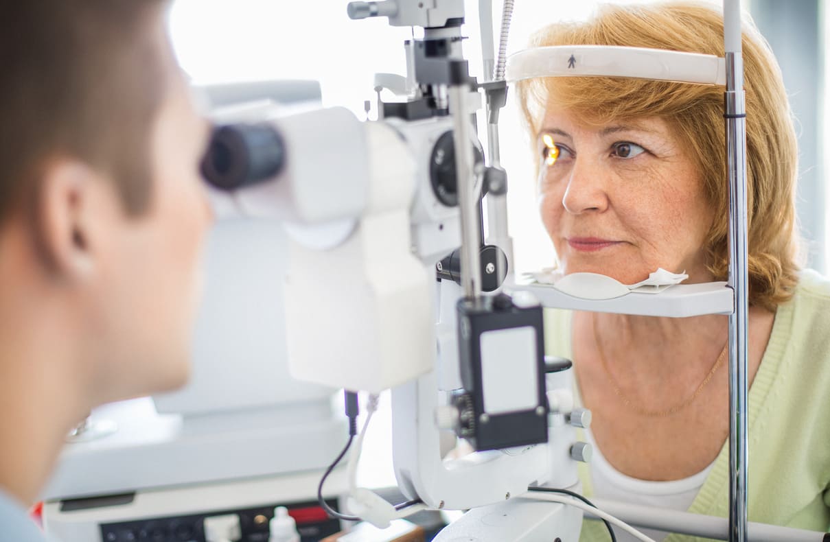 Woman getting eye exam