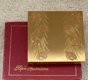 gold compact