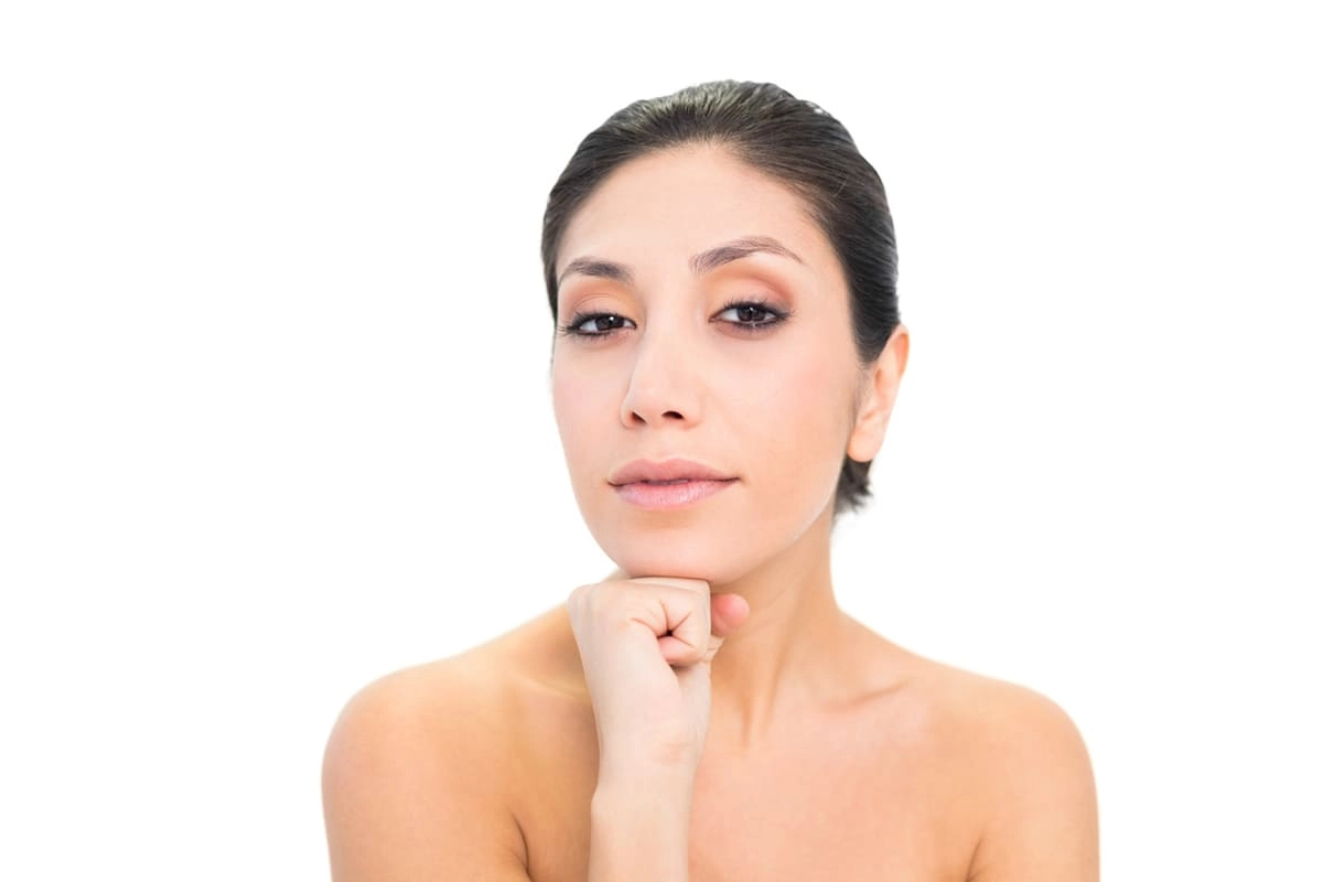 woman resting her chin on her fist