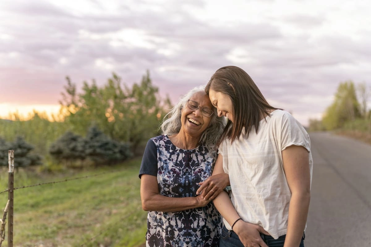 Mother and daughter laughing