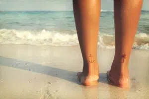Minimalist tattoos on back of legs