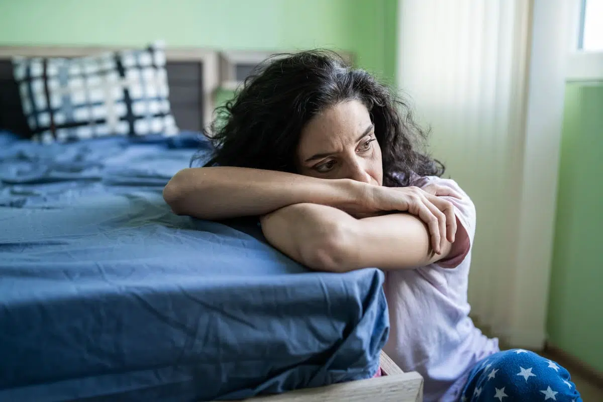 sad woman; who to call when mom dies feature
