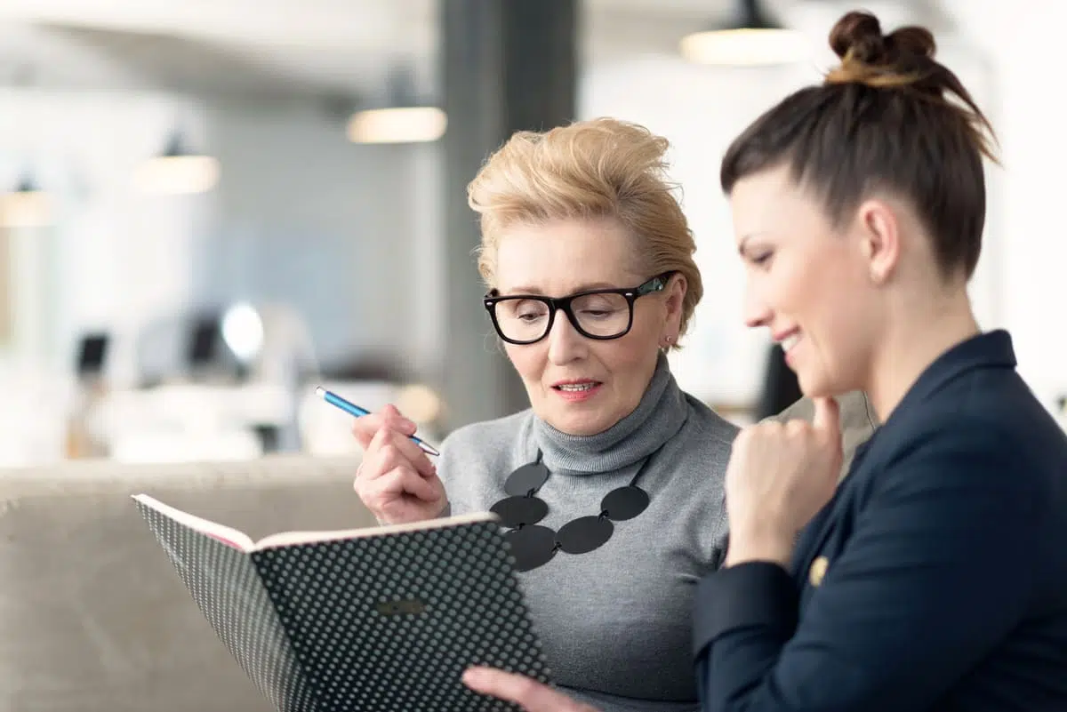 mentor; businesswomen having discussion