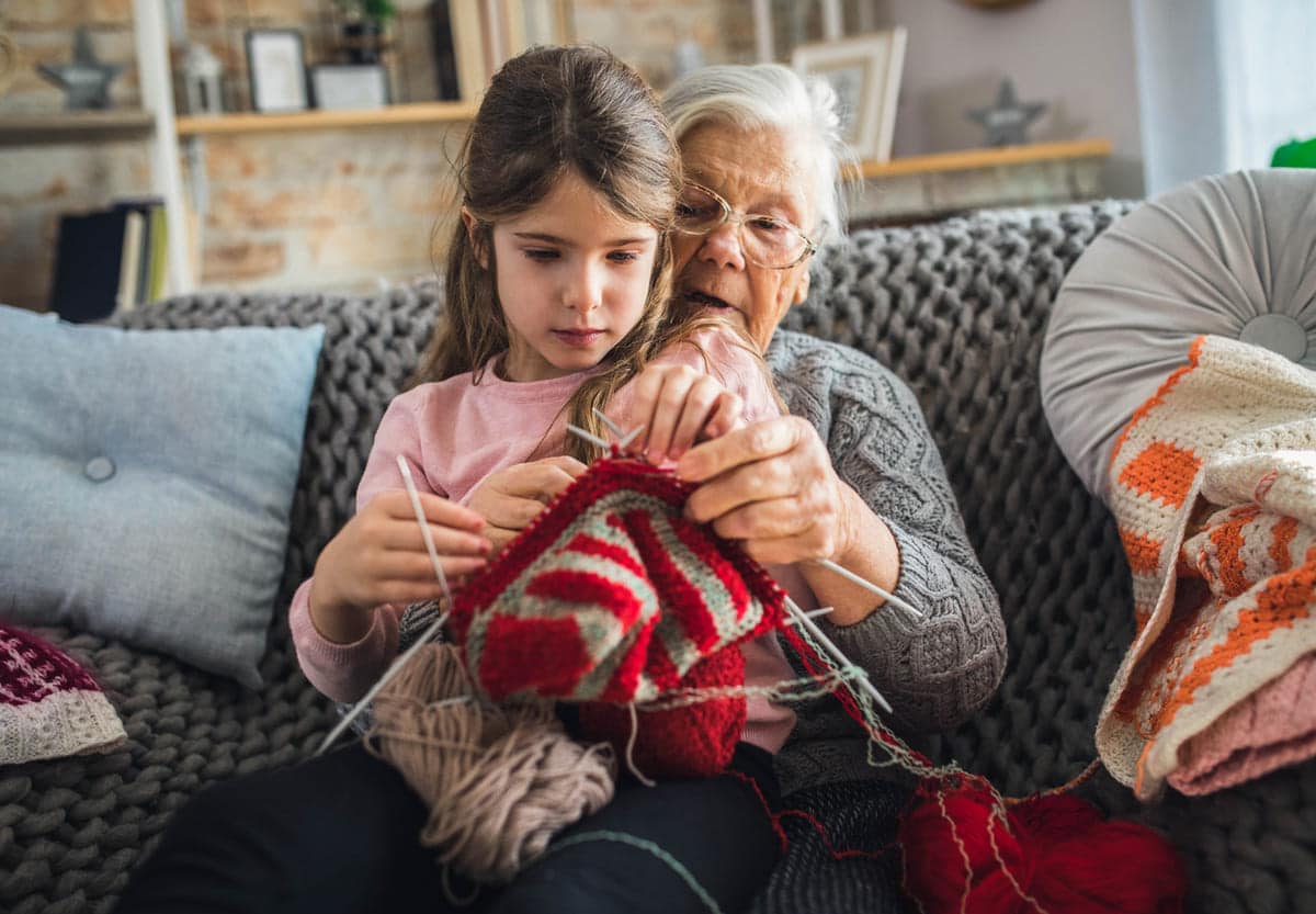 grandma teaching how to knit