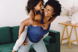 grandmother playing with granddaughter