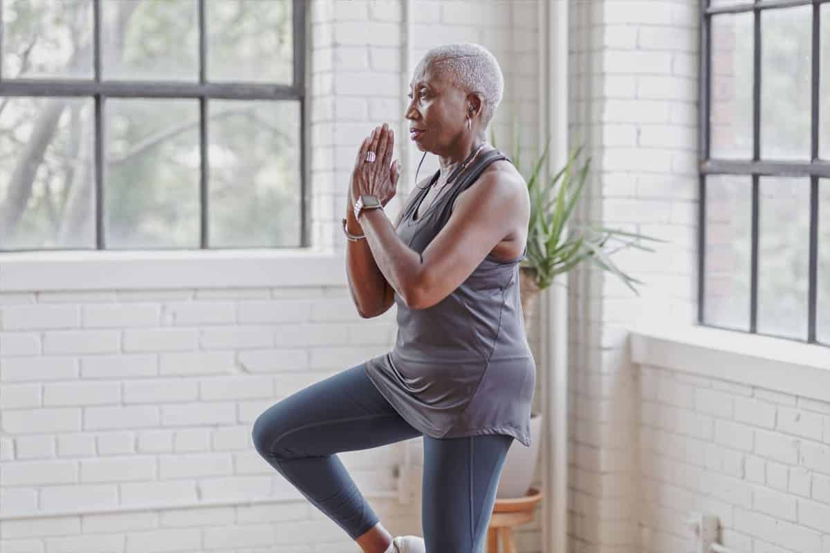 Woman doing a balancing pose yoga