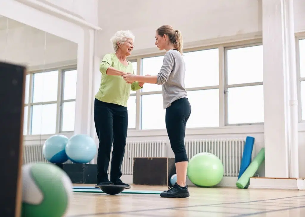 Working with a trainer for balance