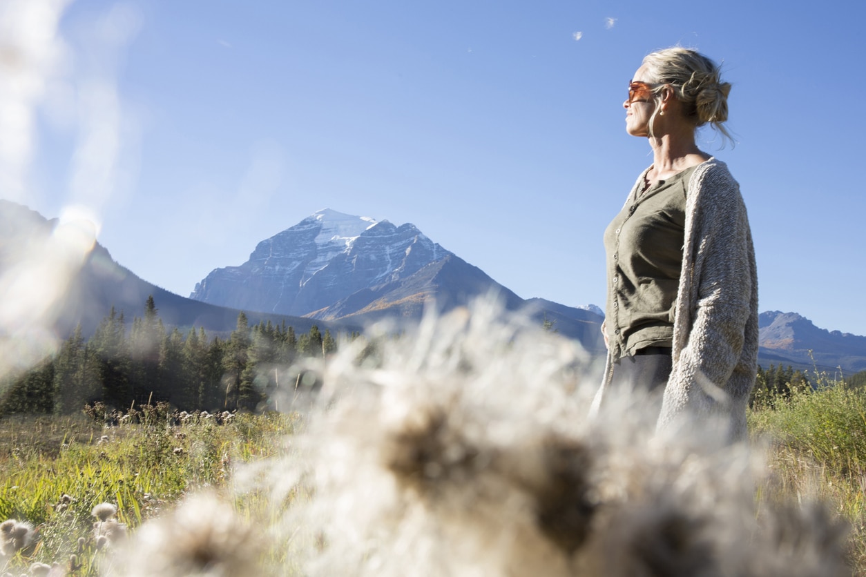 Best updo for short thin hair, woman hiking, grey haired woman in the mountains