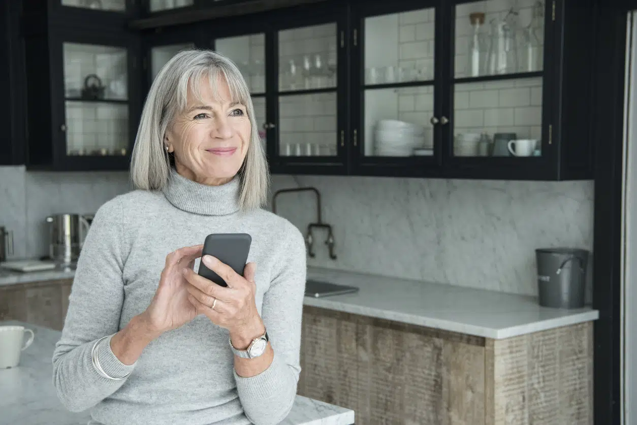 Woman in a grey turtleneck