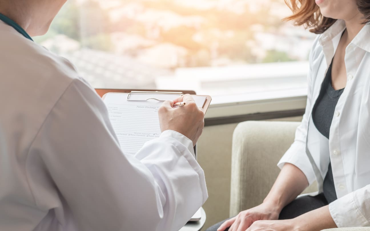 Woman talking to her doctor about menopause
