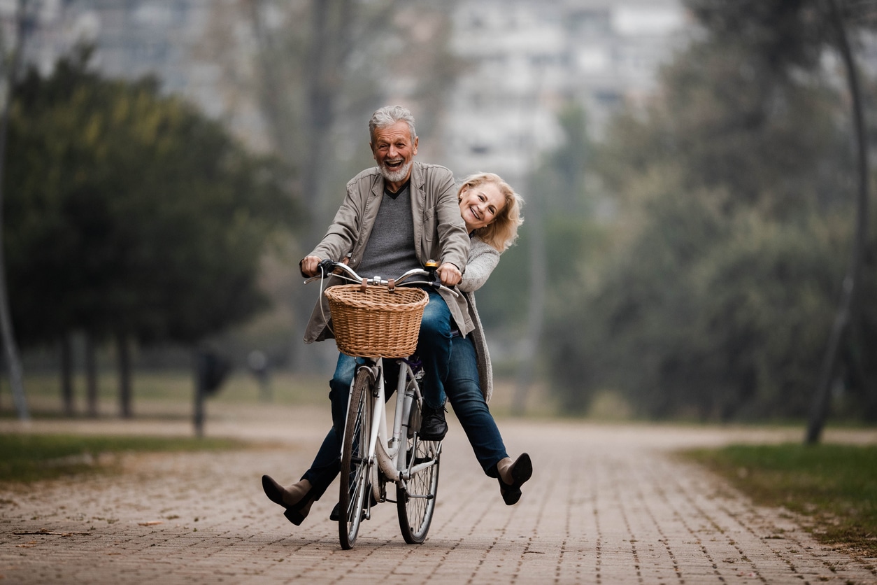 Couple riding a bike together