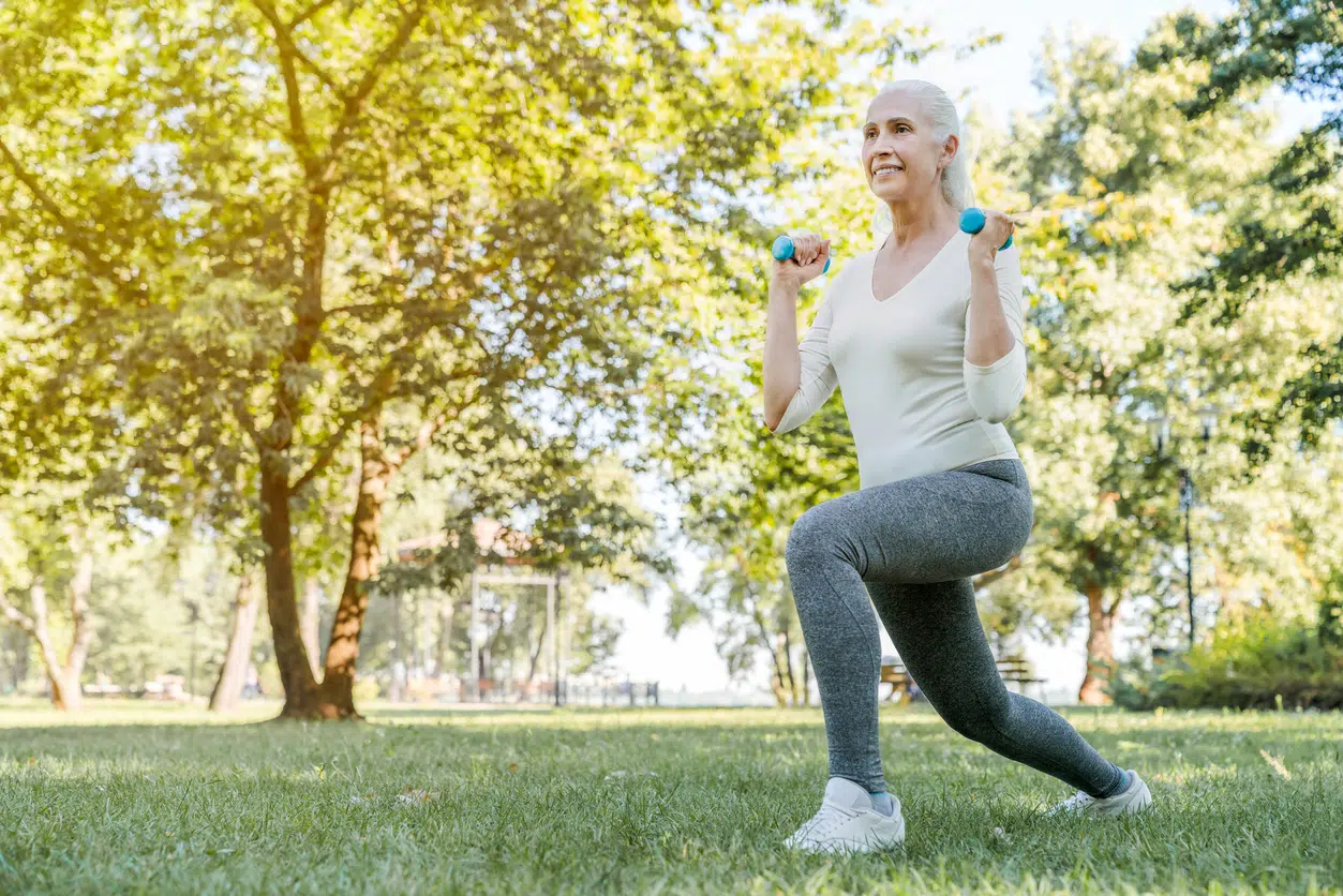 Older woman doing squats