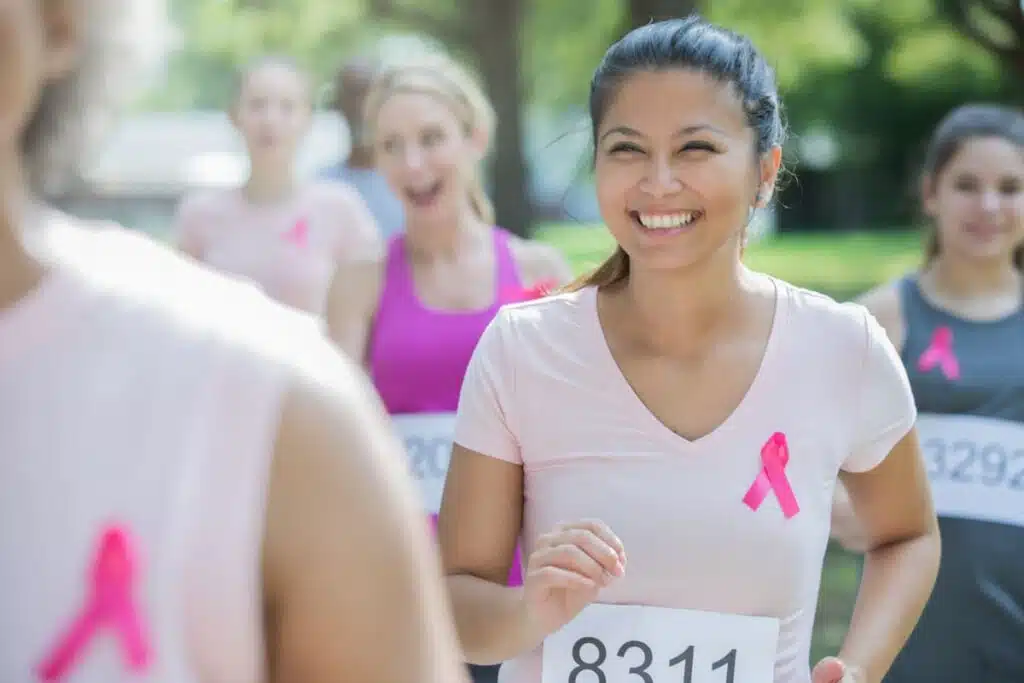 Woman running and breast cancer prevention