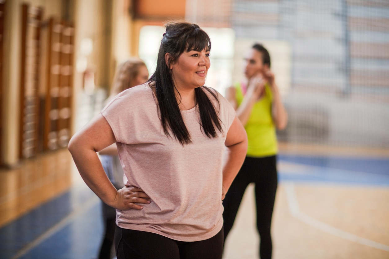 woman at exercise class with her hair half up
