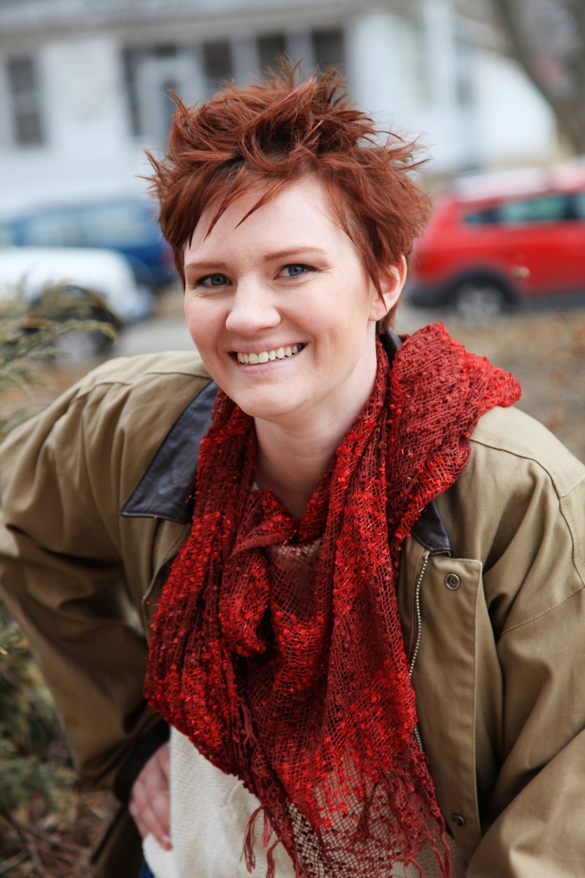 Woman with short spiky red hair