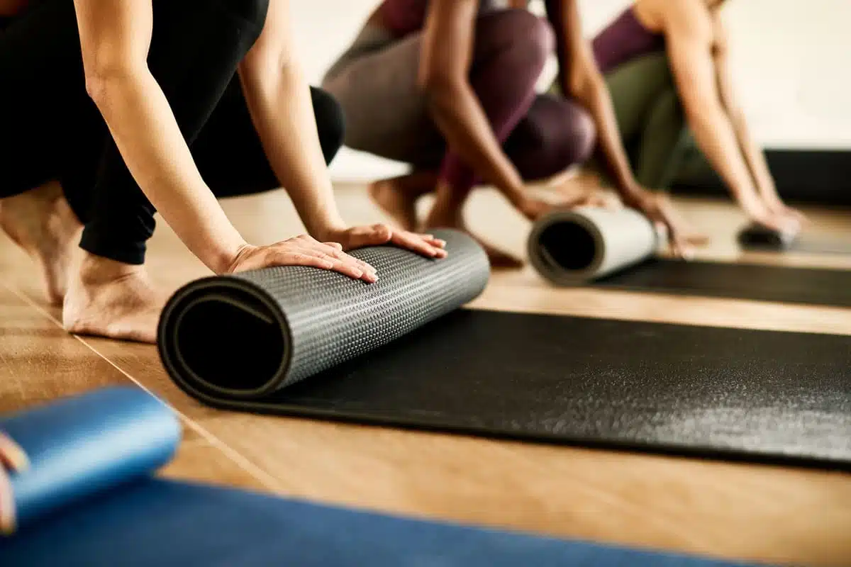 Rolling out the yoga mat