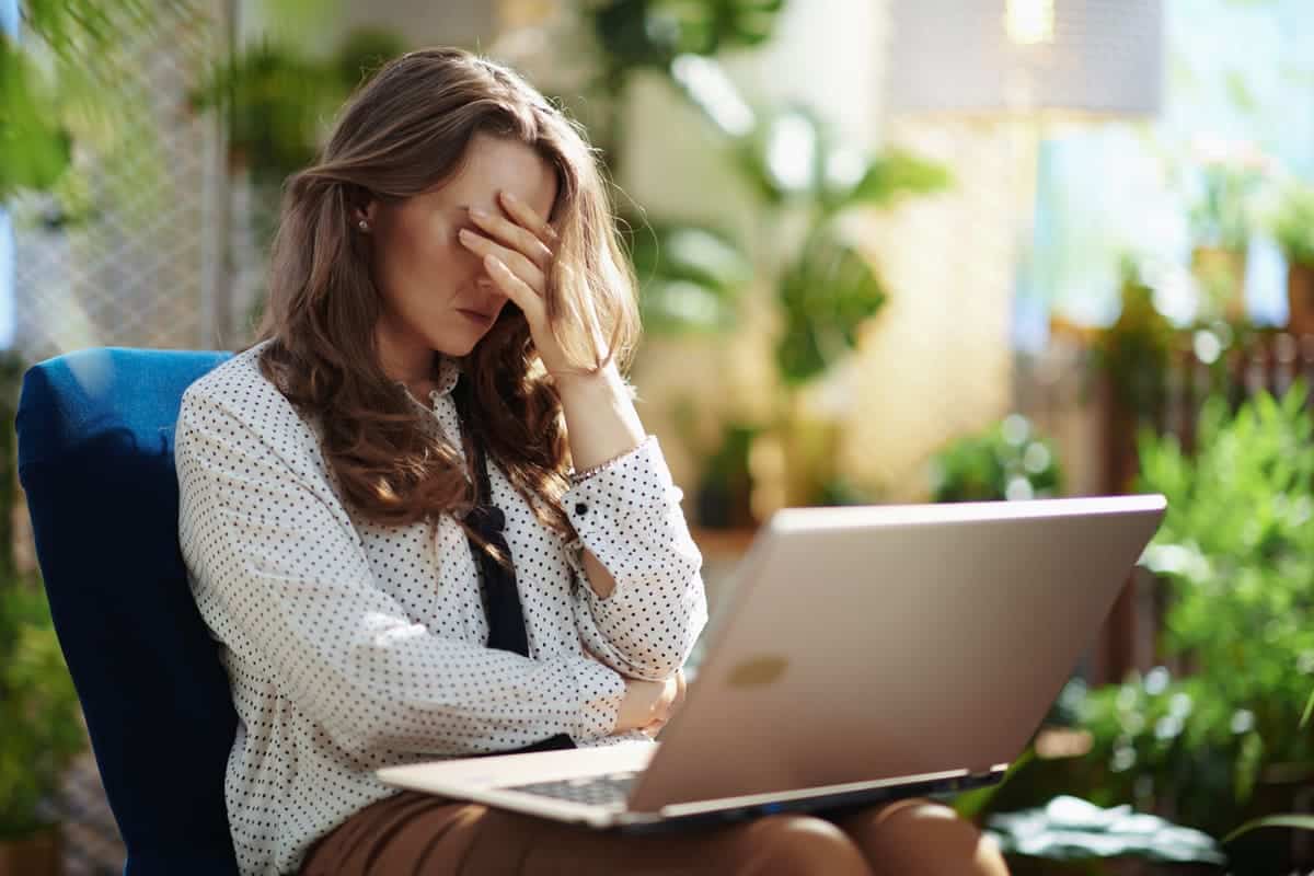 Stressed woman on her computer