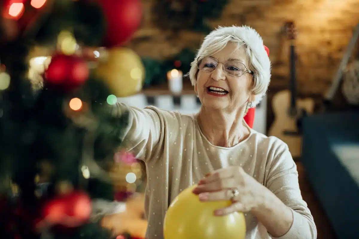 Woman decorating the tree