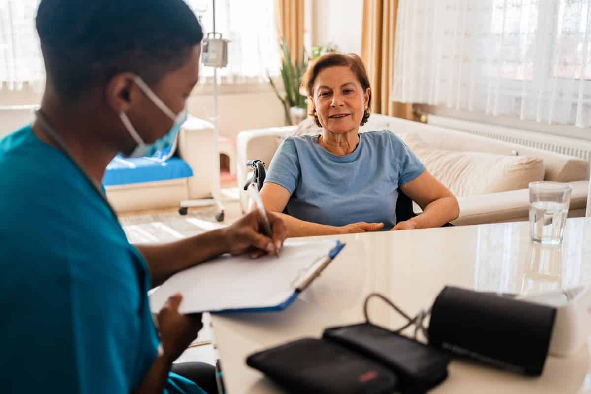 Woman discussing frailty with home health