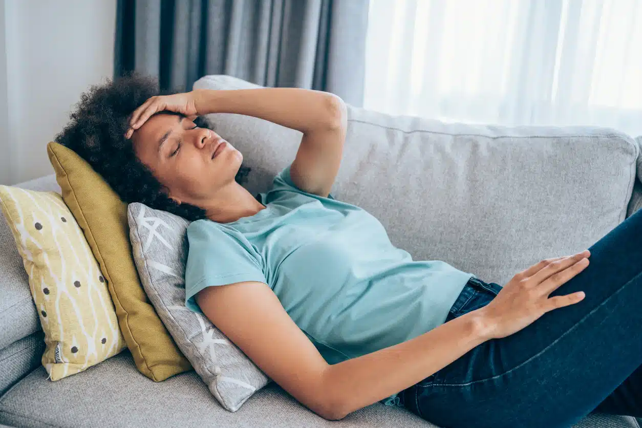 Sick woman on a couch