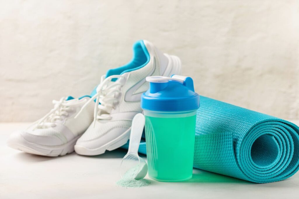 sports drink and workout mat