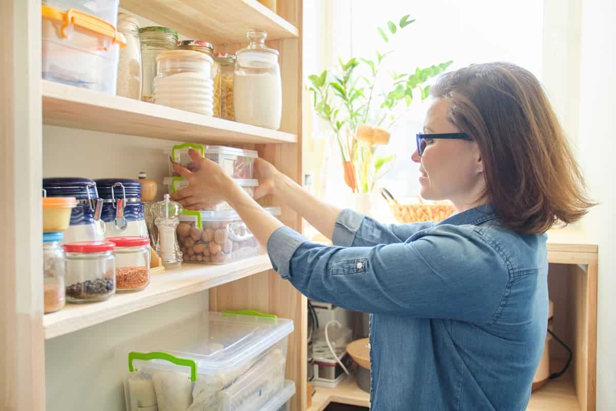woman going through her pantry