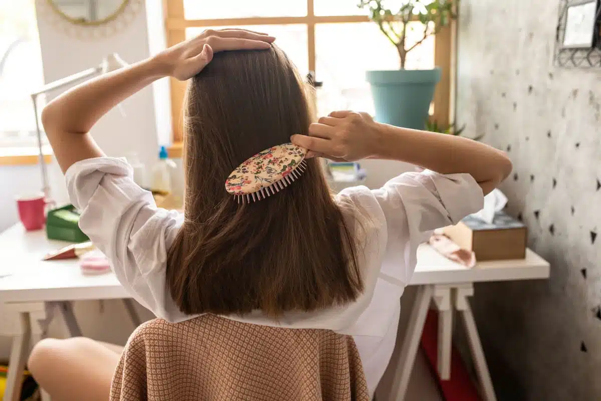 Woman brushing her hair