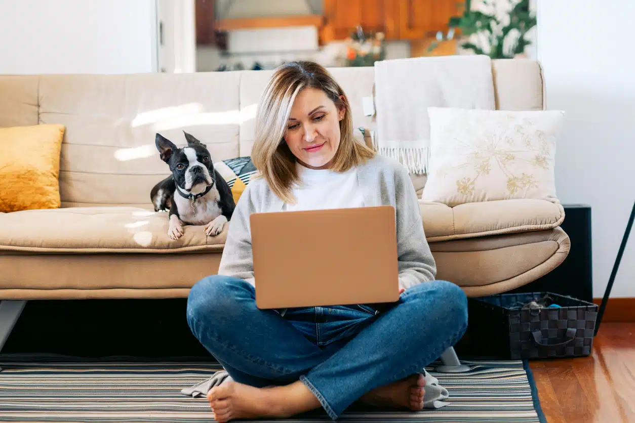 Woman working on her computer from home